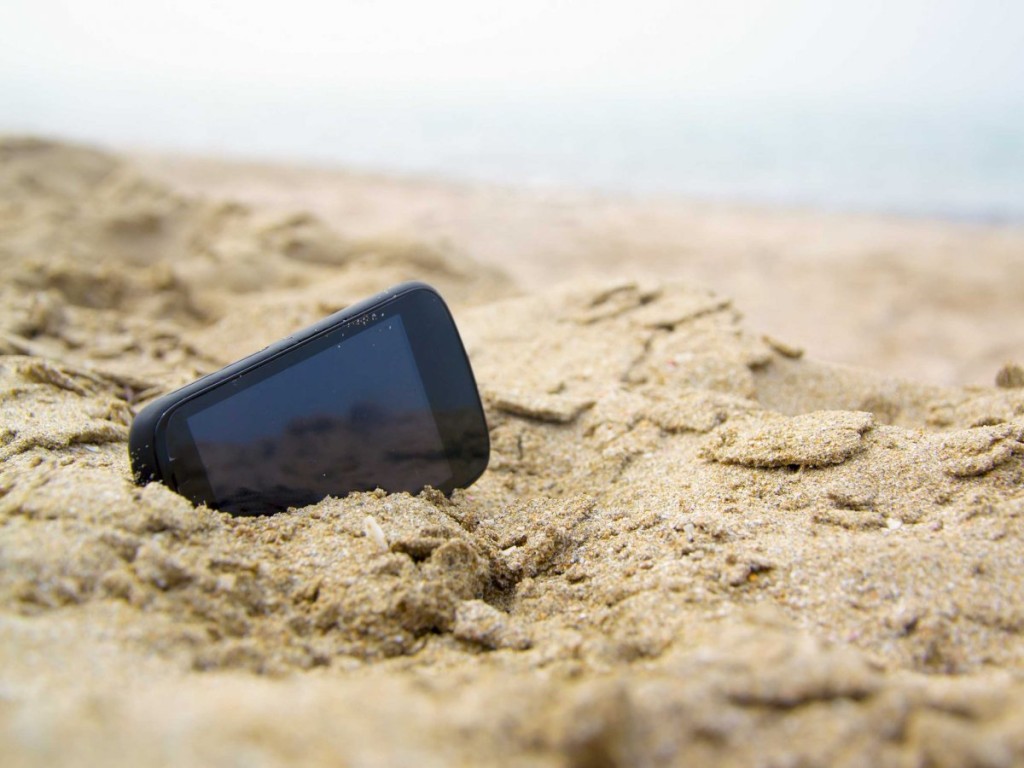 phone-in-sand